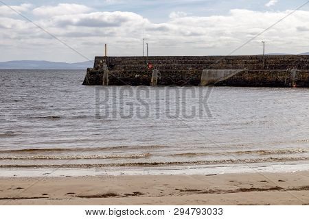 Pier And Beach In Galway Bay