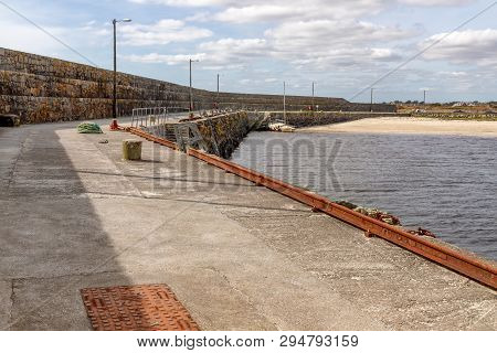 Pier And Beach In Galway Bay