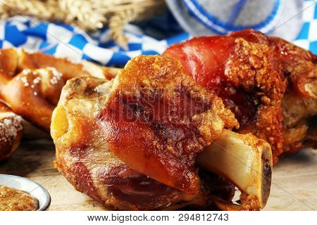 Traditional German Cuisine, Schweinshaxe Roasted Ham Hock And Pretzels