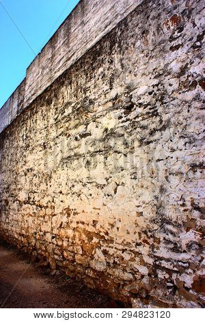 Rustic, Weathered Wall With Peeling Paint In Texas