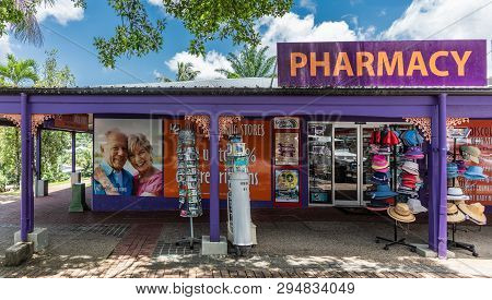Cairns, Australia - February 18, 2019: Storefront Of The Pharmacy Downtown Kuranda Village Shows Pur