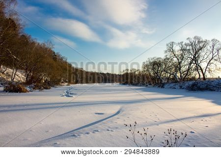 Panorama Of A Snow-covered River In A Winter Day