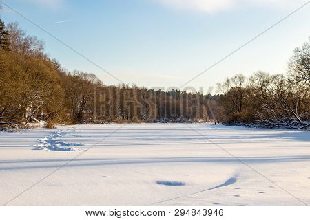 Panorama Of A Snow-covered River In A Winter Day