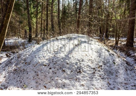Ancient Baltic And Slavic Mounds In The Winter Forest