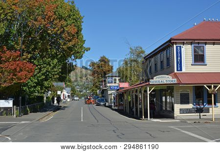 Akaroa, New Zealand - April 09, 2019: The Main Street Of Akaroa In Autumn Including The Restored His