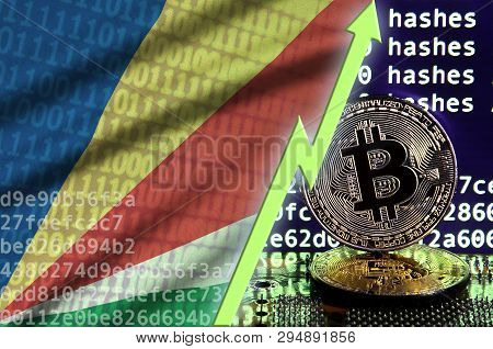 Seychelles Flag And Rising Green Arrow On Bitcoin Mining Screen And Two Physical Golden Bitcoins