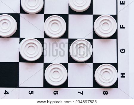 Checkerboard With Checkers. Business Strategy Competition, Strategic Planning For Winning Success. H