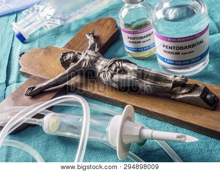 Vial With Doses Of Pentobarbital Next To A Crucifix, Debate Between Life And Death, Religious Belief