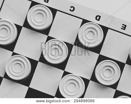 Checkerboard With Checkers. Business Strategy Competition, Strategic Planning For Winning Success. H