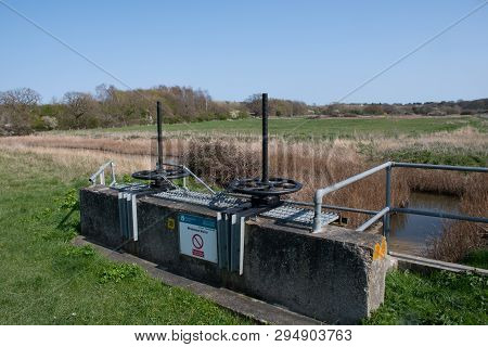 Wrabness Suffolk Uk  - 1 April  2019:  Flood Control Sluice Used For Water Management Near Coast