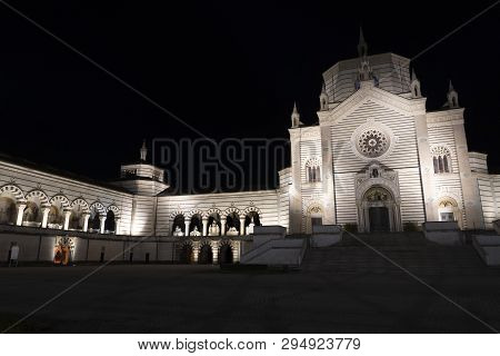 Milan, Lombardy, Italy: Exterior Of The Historic Cemetery Known As Cimitero Monumentale By Night
