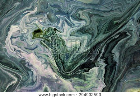 Abstract Artistic Texture. Acrylic Paint And Liquid Inks Are Mixed In The Water. Color And Its Trans