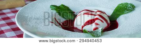 Strawberry Pana Cotta. Plate Of Tasty Pana Cotta With Strawberry Sauce.