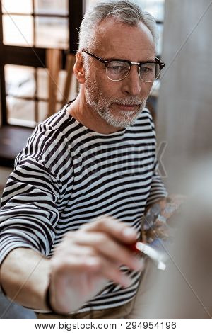 Artist Feeling Inspired While Working On New Brushwork