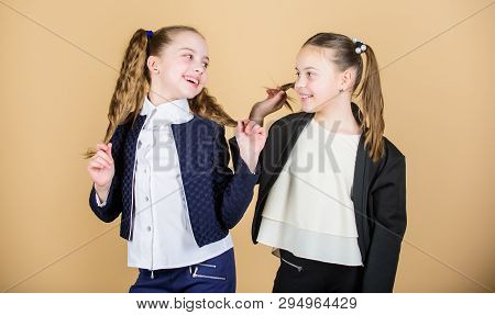 Girls Enjoy Having Long Hair. Hairstyle For Female. Cheerful Friends Made Same Hairstyle For Fun. We