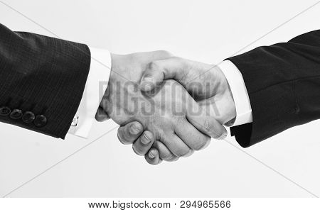 Shaking Hands At Meeting. Friendly Handshake Gesture. Handshake After Signing Profitable Agreement. 