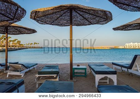 Deckchairs And Parasols On A Beach Of The Red Sea In Hurghada Egypt