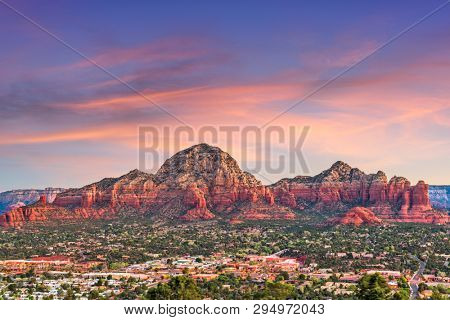 Sedona, Arizona, USA downtown skyline and mountains. 
