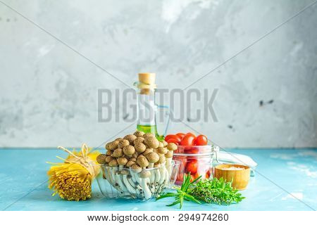 Spaghetti, Shimeji Mushroom, Olive Oil,  Pink Salt, Empty Ceramic Bowl, Wooden Spoons For Salad Over