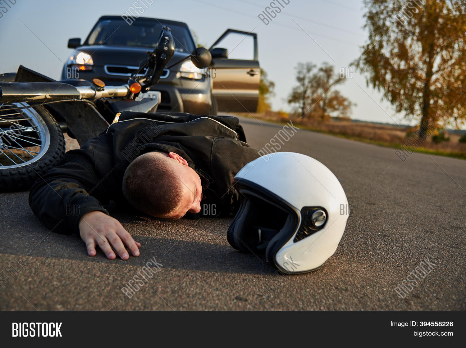 Motorcyclist Lies On Image & Photo (Free Trial) | Bigstock