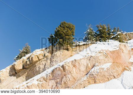 Beautiful Rock Mountains Covered With Snow In Winter In Uzbekistan In The Area Of Beldersay Resort
