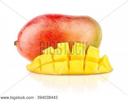 Mango exotic fruit with half cut piece. Whole fresh mango with yellow pulp isolated on white background. Fruit with clipping path included. Full depth of field.