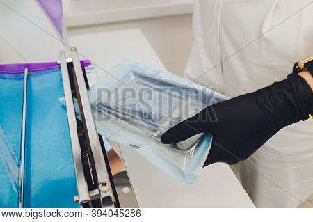 Disinfection Of A Dental Instrument. Ultrasound Sterilization Of A Medical Instrument. Disinfection 