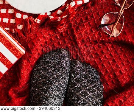 Pair of silvery black socks on a Christmas holiday