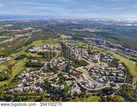 Aerial Photo Spanish Las Colinas Golf Course Modern Luxury Villas And Surrounding Countryside. Medit