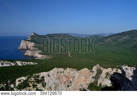 View Of Punta Carone And Punta Cristallo In The Coast Of Capo Caccia