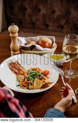 Fresh Salad Plate With Shrimp, Tomato And Mixed Greens On Wooden Background Close Up. Healthy Food.h