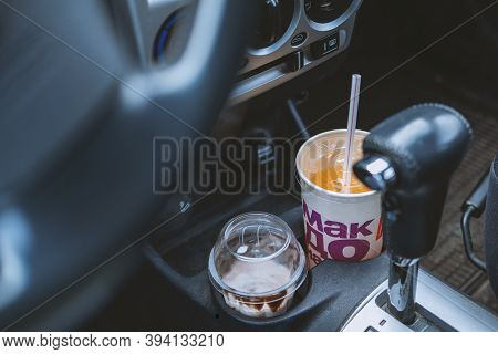Chekhov, Russia - Oktober 03, 2020: Food And Drink From Mcdonalds Restaurant In The Car. Auto Cafe.