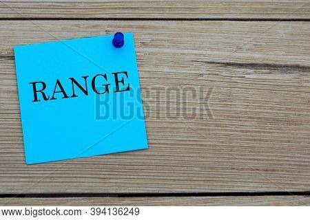 Range Is An Acronym Written On A Blue Sheet Attached To A Wooden Board. Busines Concept. Keep It Sim