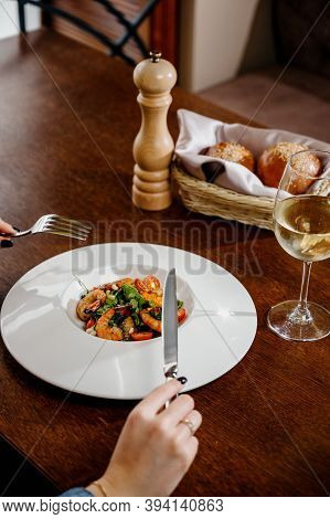 Fresh Salad Plate With Shrimp, Tomato And Mixed Greens On Wooden Background Close Up. Healthy Food.h