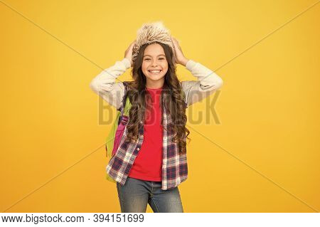 Winter Events At School. Winter Entertainment And Activities. Child Schoolgirl Soft Hat Enjoy Season