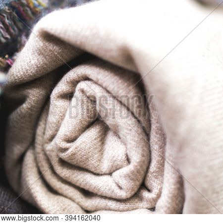 Pile Of Clothes, Rolled Beige Cashmere Blanket, Knitting Cashmere Wool Yarn, Closeup Beige Blanket, 