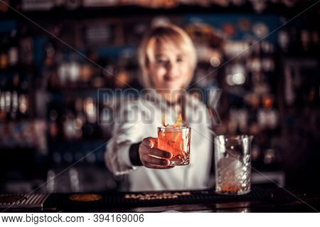 Girl Bartender Makes A Cocktail In The Beerhall