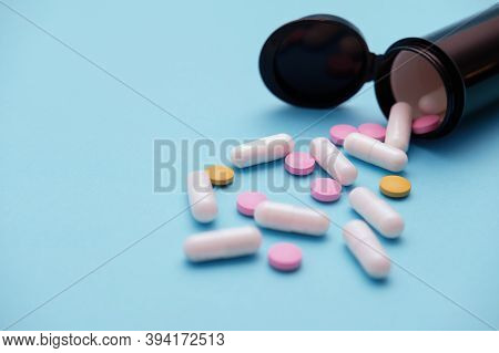 Opioid Epidemic, Painkillers And Drug Abuse Concept With Close Up On A Bottle Of Prescription Drugs 