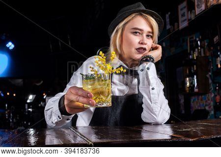 Girl Bartender Creates A Cocktail In The Pothouse
