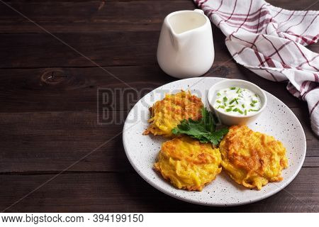 Fried Cakes Of Grated Potatoes On The Plate With Sauce. Traditional Pancakes Boxty Raggmunk.