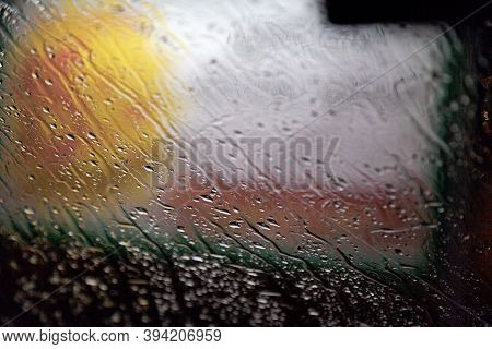 Rain And Water On The Car Window At Night