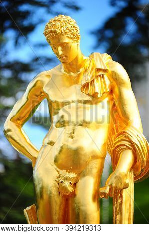 Russia, St. Petersburg, 27.06.2010  Gold Plated Sculptures By Fountains Grand Cascade In Pertergof,