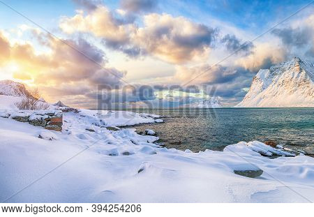 Fabulous Winter View Of Vik Beach During Sunset With Lots Of Snow  And Snowy  Mountain Peaks Near Le