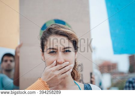 Group Of People Activists Is Protesting.
Let Me Speak. Photo Of Activist Woman Can't Stand Unfair So