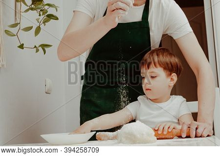 Little Boy Helps Mother To Cook  Making Homemade Coockies. Casual Lifestyle In Home Interior, Pretty