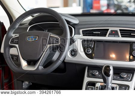 Russia, Izhevsk - August 14, 2020: Geely Showroom. Interior Of New Modern Car Geely Atlas In Dealer 