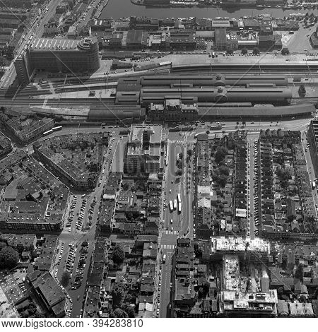 The Hague, Holland, August 29 - 1977: Historical aerial photo  in black and white of t old railway station Hollands Spoor and the PTT, post office building