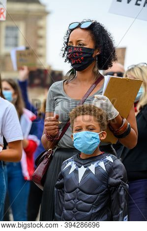 Richmond, North Yorkshire, Uk - June 14, 2020: Strong Female Leader Wears Black Lives Matter Ppe Fac