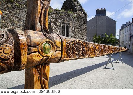 Waterford, Ireland - July 26 2019: A Wooden Sculpture Of A Giant Sword Called The Dragon Slayer Swor