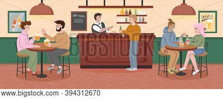 People Sitting At The Tables In A Bar And Drinking Beer And Wine. Women And Men Talking And Smiling 